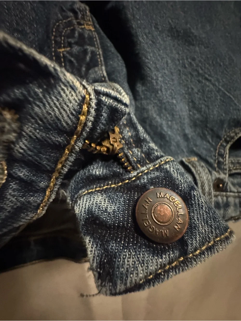 Magellan Outdoors Men’s Relaxed Blue Denim Jeans with Brown Patch